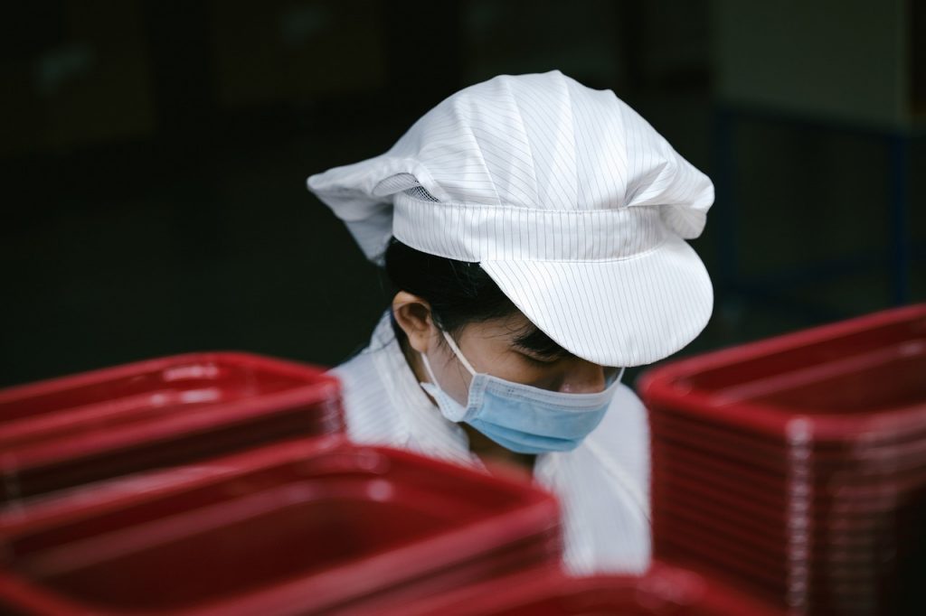 Woman working in a factory in Asia